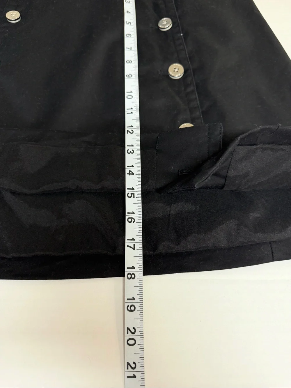 Michael Kors black lined mini skirt with double row silver buttons